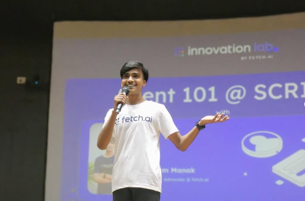 Gautam Manak speaking at a tech event